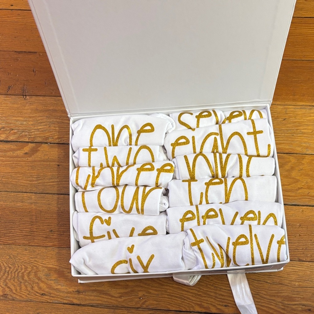 White and Gold Numbered Baby Onesie Set. Good BABY SHOWER GIFT! 💛